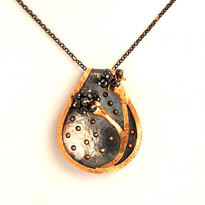black diamond with 24k pure gold and .999 pure silver