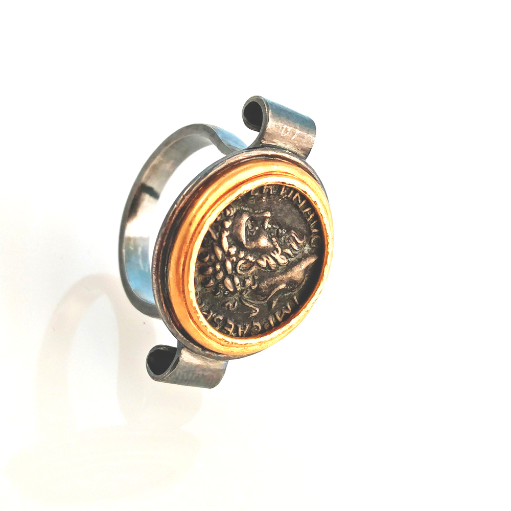 by mehmet unver coin ring 24k gold silver